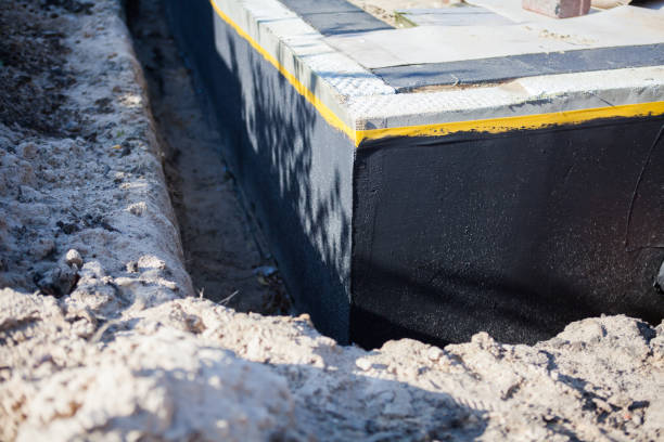 Professional Waterproofing technician working in Brookpark, OH